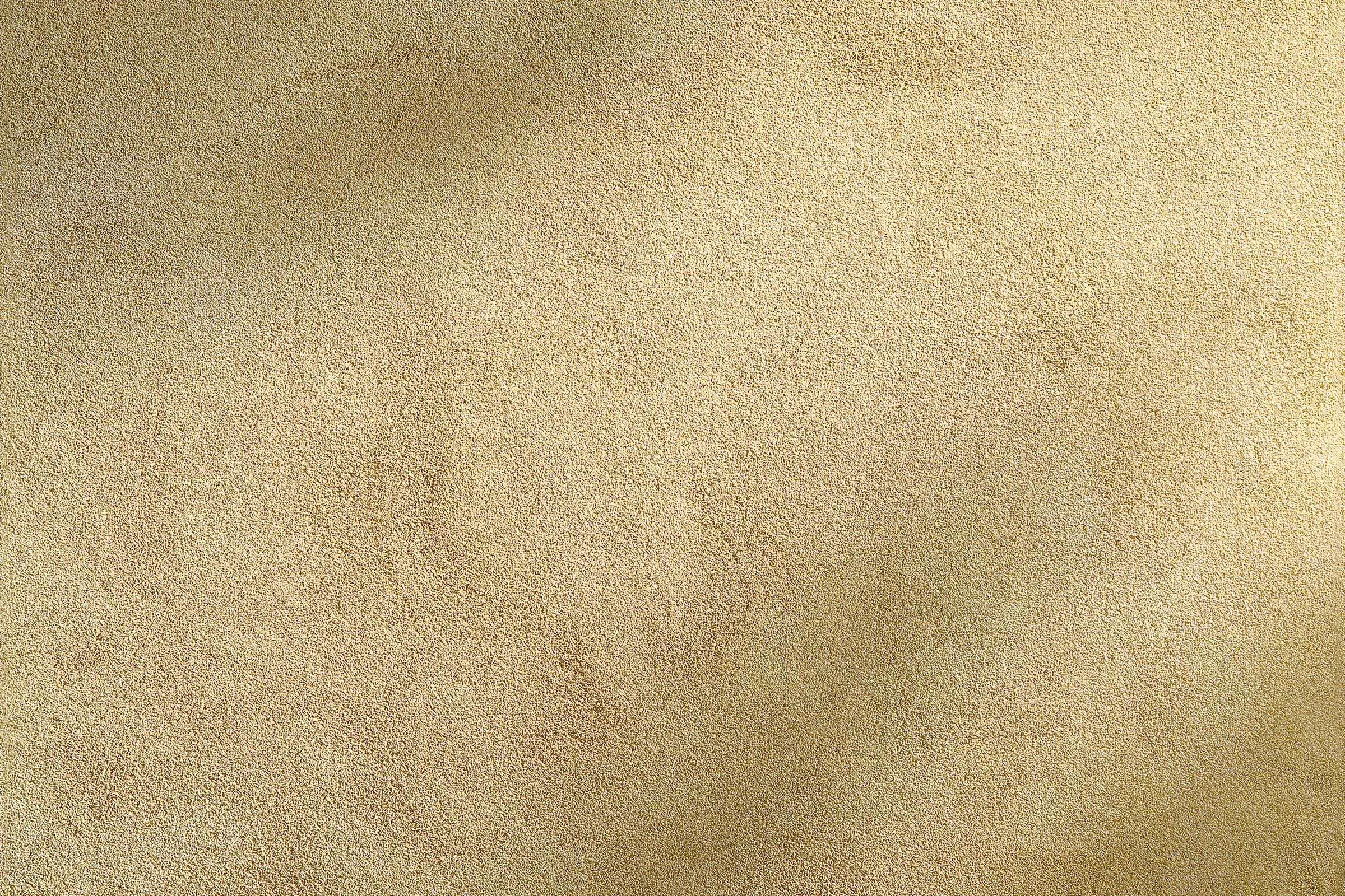 Rollputz, Fassadenputz StoMiral K6, goltgelbe Putzoberfläche