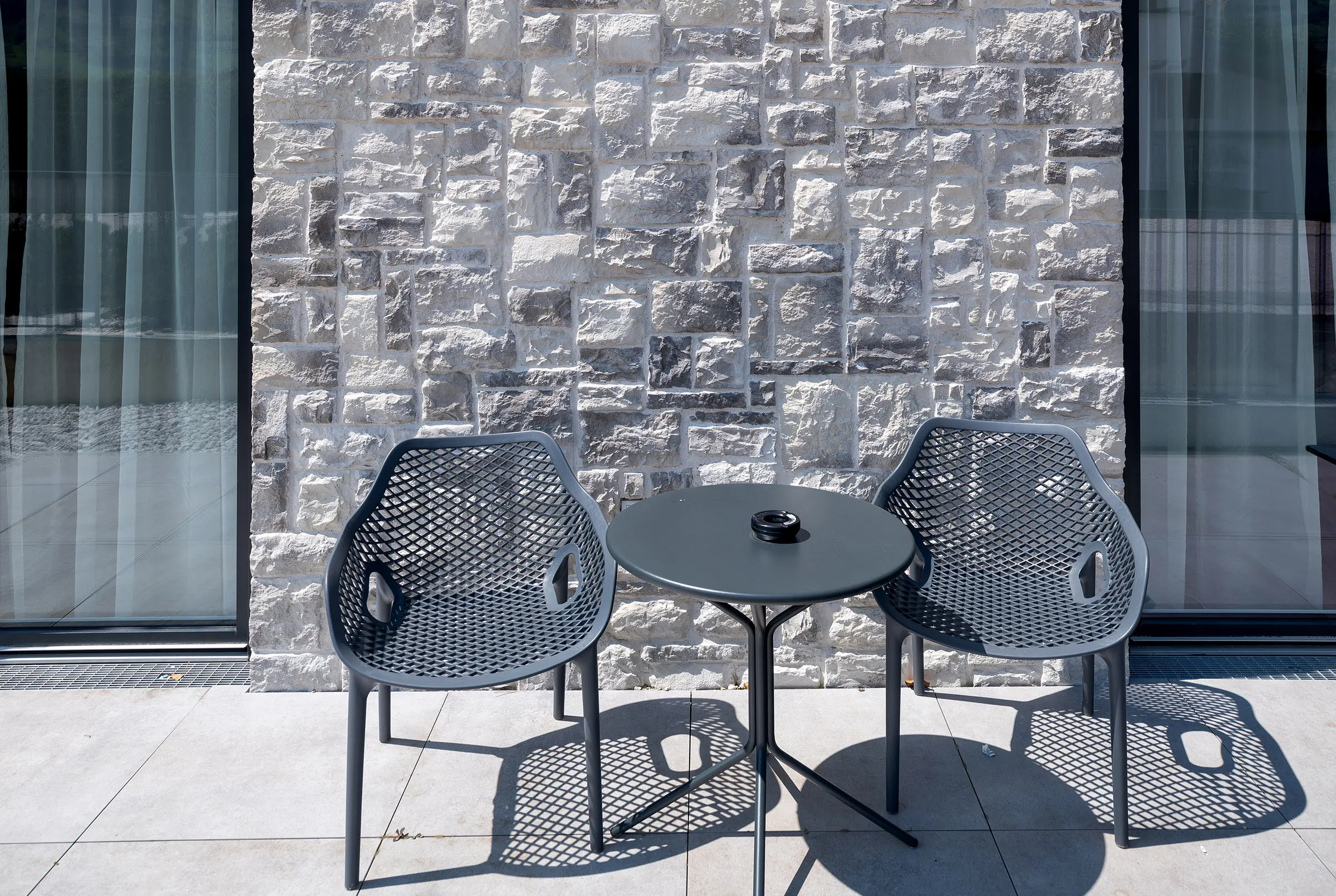 Aureus Prime Resort, Fügen, StoCresto S, plastische Steinverblender, Fassade, StoTherm Wood